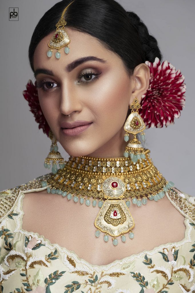 female modeling poses with jewellery