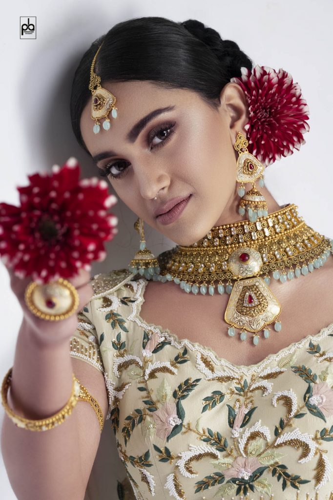 female modeling poses with jewellery